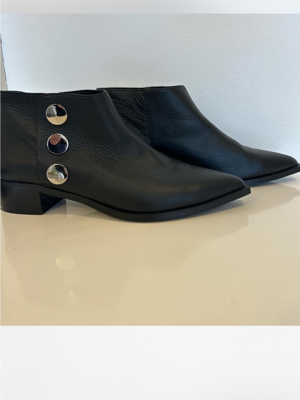 Black Leather Ankle Boots with Silver Button Accents